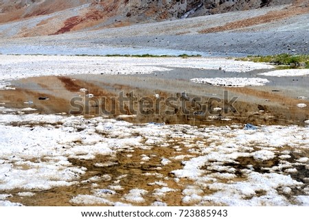 Reflection in a salt lake. Death Valley Zarbriskie Point  National Park California.