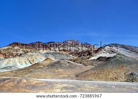 All the colors of the rainbow on the rocks. Artist drive.  Stunning picture of nature. Artist’s Palette. Death Valley Zarbriskie Point  National Park California 