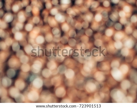 Bokeh of fried coffee beans on top table background 