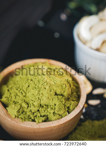 Organic natural  japanese matcha green tea powder in wooden bowl