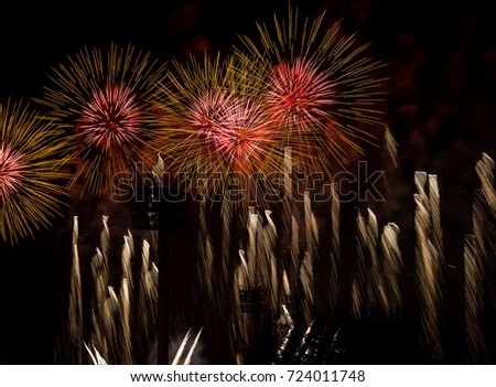 Beautiful fireworks in the dark sky in Moscow