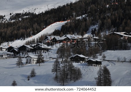 Mountain ski resort with snow in winter. Alps, France. panoramic view of mountains on a clear sunny winter day, Switzerland. mountain ski slope