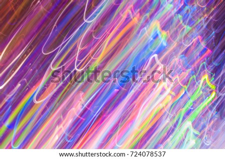 Blurred colorful lights in motion. Abstract background