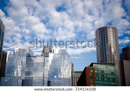 View of buildings in boston financial district from boston seaport over fort point channel international place
