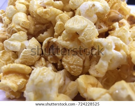 Corn baked with butter or popcorn Caramel Sauce.