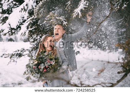 Long-awaited meeting of two lovers. Young pretty pair of lovers. Winter. Date. A pair of lovers on a date in the mountains
