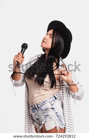 charming girl singer in clothes style casual