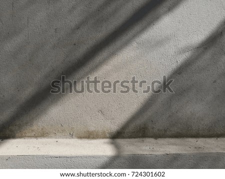 Shadow shade on concrete wall background