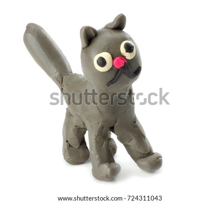 Kid's modelling clay cat isolated on white background