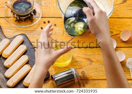 Photo of cooking tiramisu, human hands, cookies