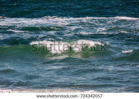 The sea storm wave with splashes closeup, wonderful view of seascape, marine background.