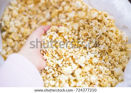 popcorn in the hands