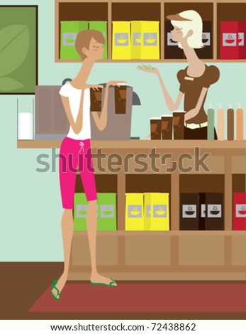 A customer at a coffee shop paying for her coffees.