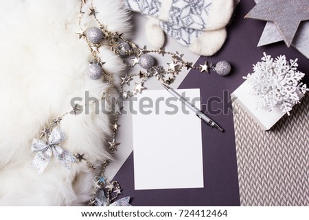 Holidays background. Blank paper Christmas card. copyspace of winter and Christmas concept.  flat lay style. Christmas planning concept.