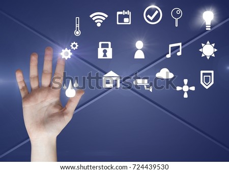Digital composite of Hand touching icons interface of internet of things