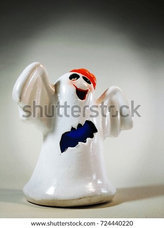 Halloween ghost on isolated white background.
