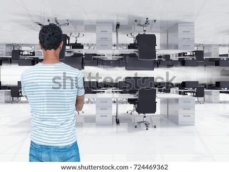 Digital composite of Man standing in inverted office in the clouds with skyline