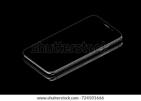Black smartphone on the black glass background with pretty reflections
