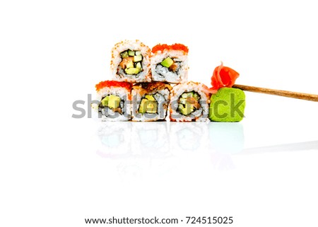 Sushi set roll isolated on white background with reflection.