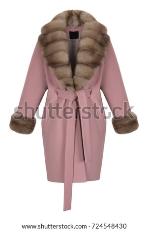 Beautiful, luxurious female pink woolen blouse with a natural fur collar and sleeves on a white background