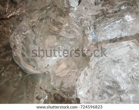 Ice cubes glittering like diamonds. 