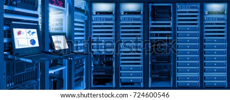 Monitor show information of network traffic and status of devices in data center room Royalty-Free Stock Photo #724600546