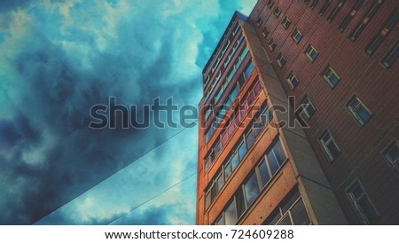 The Highbuilding and the dark clouds