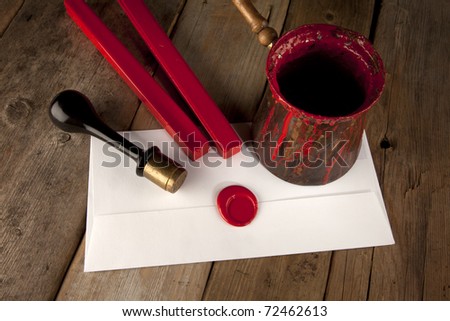 Red wax staff with stamp, pot and letter