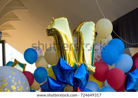bunch of colorful birthday balloons