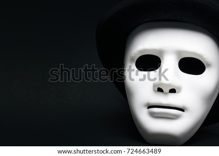 White human mask isolated on black background