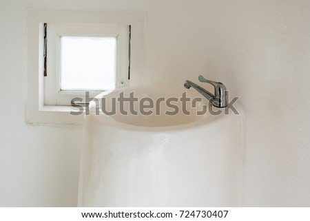 Clean and fresh bathroom with basin natural light and decorated with retro style. Copy space background. modern interior