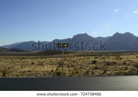 One Way road sign in Mojave desert landscape