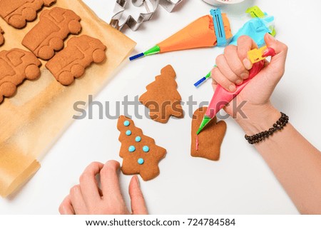 Decorating of gingerbread cookies  with icing