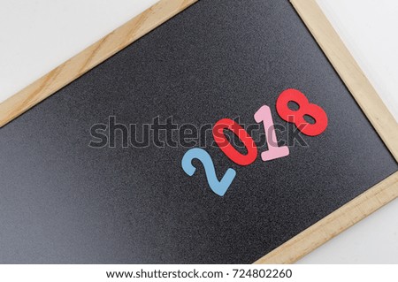 A black board with 2018 number on it.