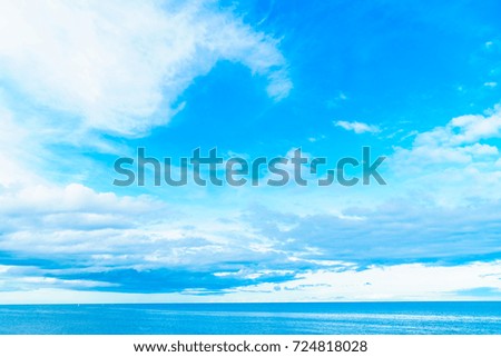White cloud on blue sky  with seascape and ocean background