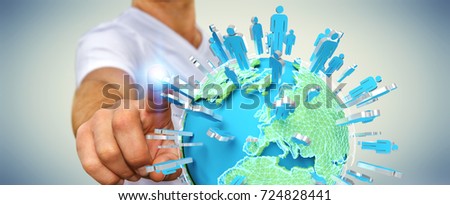 Businessman on blurred background holding 3D rendering group of people surrounding planet Earth