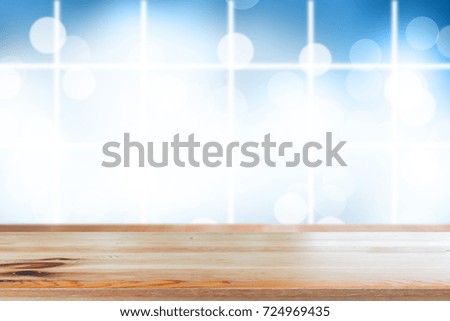 Wooden desk with abstract background bokeh circles for Christmas, newyears or sweet valentines background