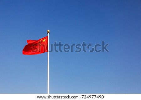 China's Five Starred Red Flag under the blue sky