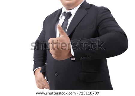Businessman In Suit Giving Thumbs Up