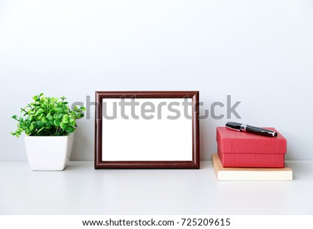 Workspace mock up picture frame on desk In modern office