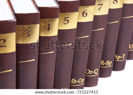 Encyclopedia set - 10 heavy book tomes isolated Royalty-Free Stock Photo #725227453