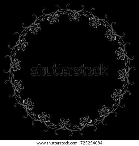 drawing of a round silver gradient frame with floral ornament on a black background