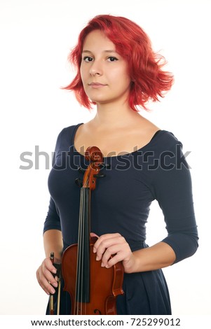 Musician young woman playing violin isolated on white background with copy space