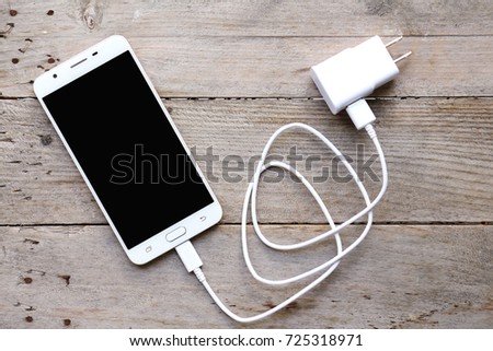 Smart mobile phone with charger