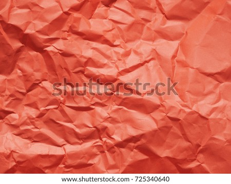 Abstract orange color crumpled paper texture background for design artwork or decorative.