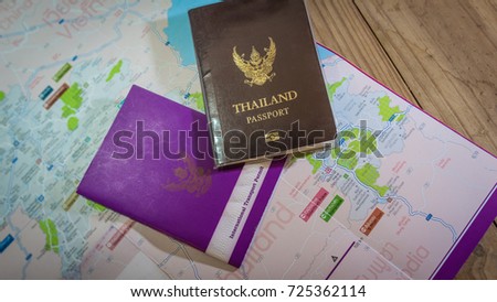 Thailand passport and vehicle passport on Laos map (Thai&English 
language)