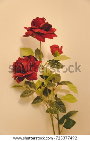 Romantic vintage rose background as concept of valentine's day. Sweet artificial roses background