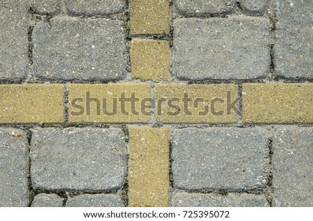 Multicolored Sidewalk Tile Texture. The Texture of Artificial Stone Pavers of Different Colors