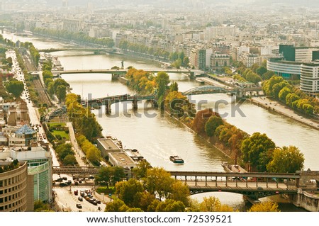 Aerial panoramic view of Paris and Seine river as seen from Eiffel Tower in Paris, France.