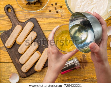 Picture of cook with cup of egg white